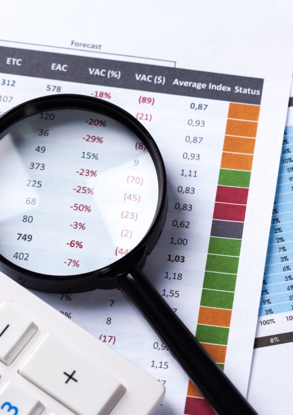 work with a magnifying glass, a calculator and papers